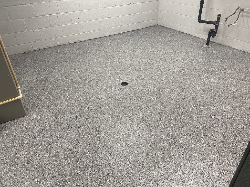 Close-up of flake concrete coating detail after professional prep in Sioux Falls