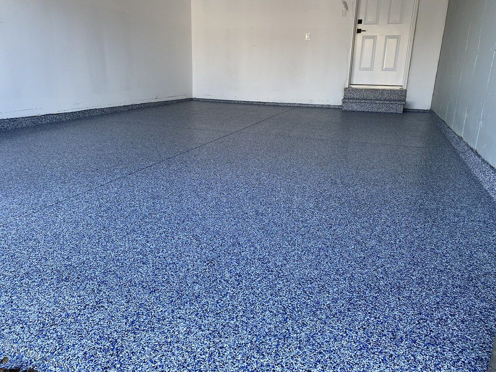Durable flake epoxy garage coating in Sioux Falls ready for polyaspartic topcoat systems